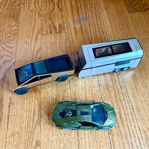 Gold tesla with RV trailer, and Green sports car Toy Set